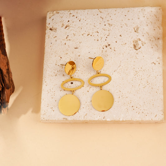 Boucles d'oreilles dorées plaque ronde pendantes