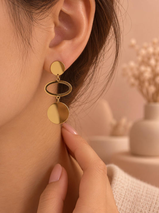 Boucles d'oreilles dorées plaque ronde pendantes
