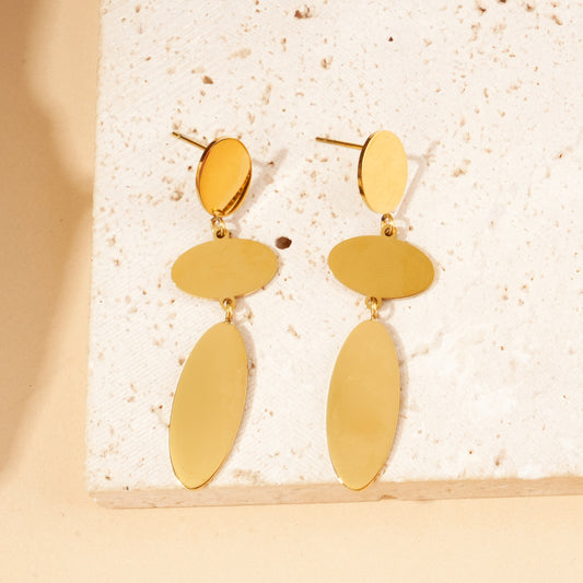 Boucles d'oreilles dorées plaques ovales pendantes