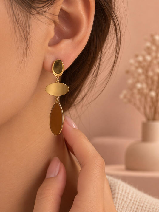 Boucles d'oreilles dorées plaques ovales pendantes