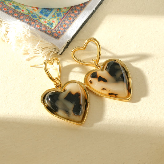 Boucles d'oreilles cœur résine léopard