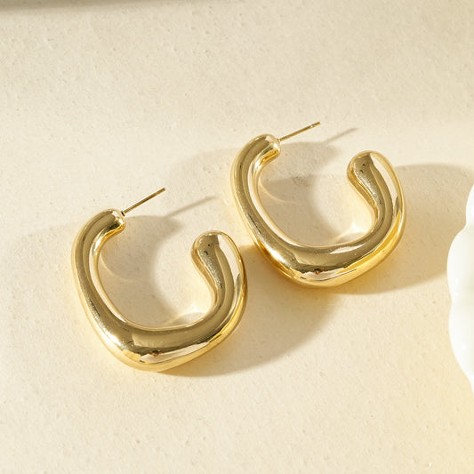 Boucles d'oreilles créoles épaisses ovales bombées