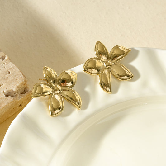 Boucles d'oreilles dorées fleur tropicale