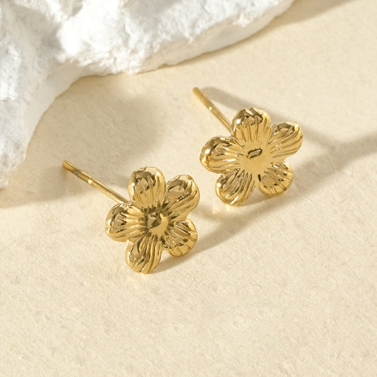 Puces d'oreilles dorées fleurs minimalistes martelées
