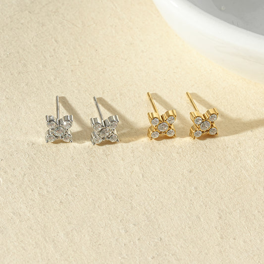 Puces d'oreilles fleurs serties de cinq strass