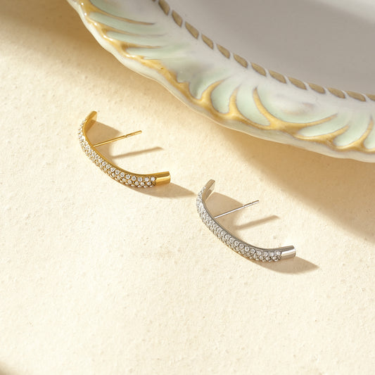 Boucle d'oreille unique lobe en forme d'arc serti de strass