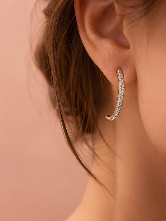 Boucle d'oreille unique lobe en forme d'arc serti de strass