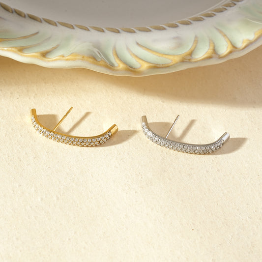 Boucle d'oreille unique lobe en forme d'arc serti de strass