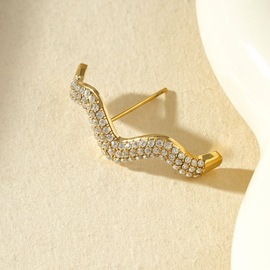 Boucle d'oreille unique lobe ondulé pavé de strass
