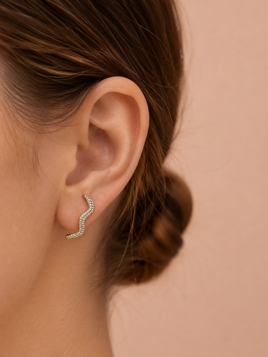 Boucle d'oreille unique lobe ondulé pavé de strass