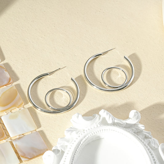 Boucles d'oreilles créoles spirale cercle