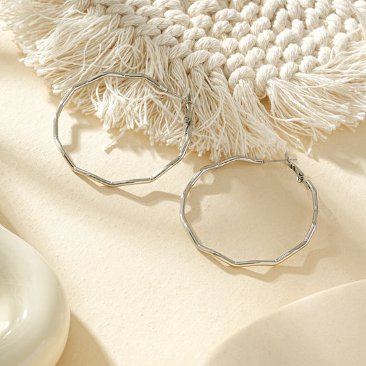 Boucles d'oreilles créoles ondulées