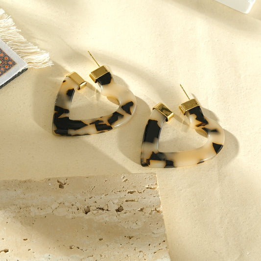 Boucles d'oreilles créoles cœur résine léopard