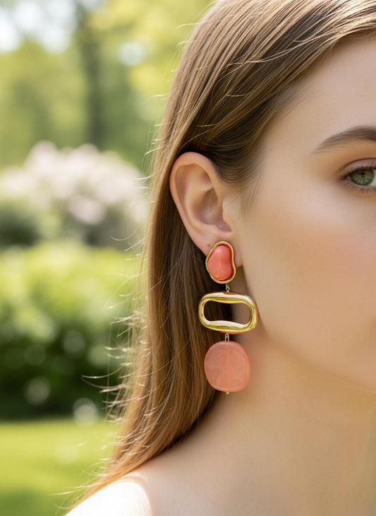 Boucles d’oreilles dorées à rectangle et à résine