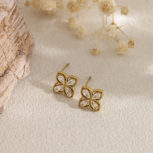 Boucles d'oreilles puces fleurs à quatre feuilles strassées