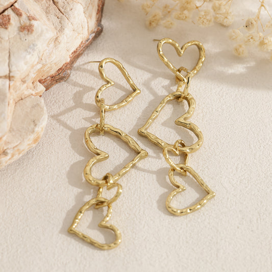 Boucles d'oreilles pendante cœurs entrelacés
