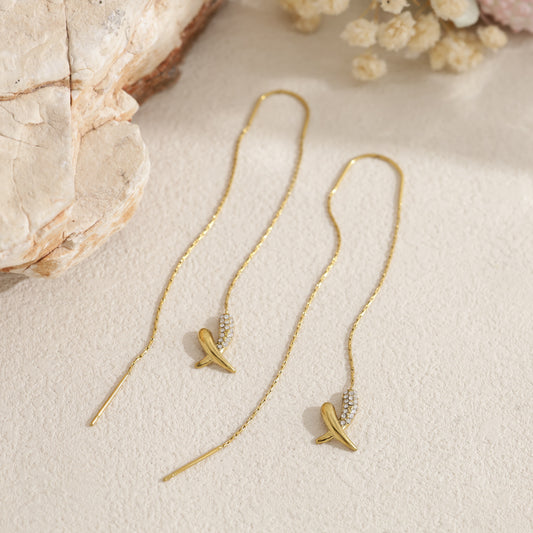 Boucles d'oreilles pendantes à enfiler croix strassée