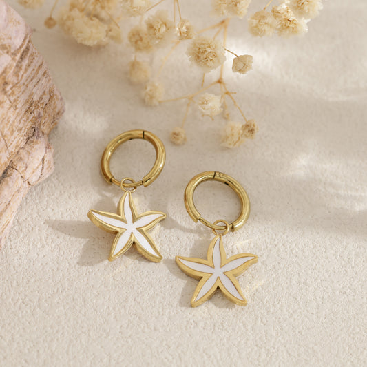 Boucles d'oreilles créoles dorées étoile nacre