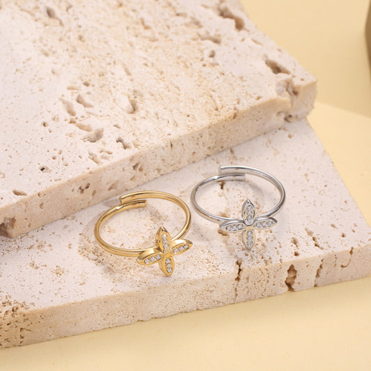 Bague fleur croix sertis
