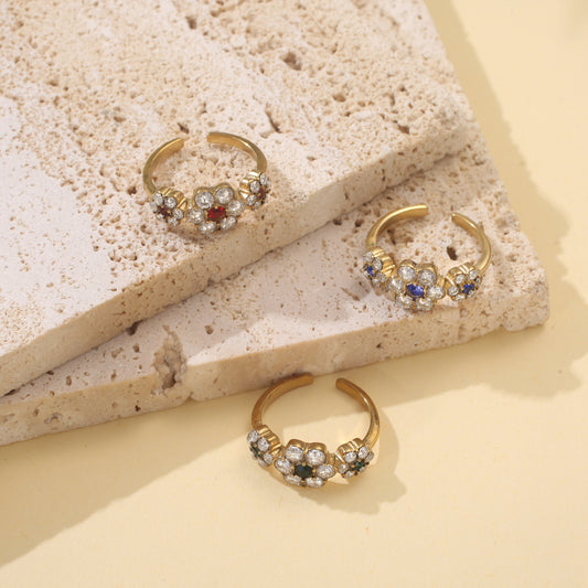 Bague ouverte trois fleurs zircons cœur