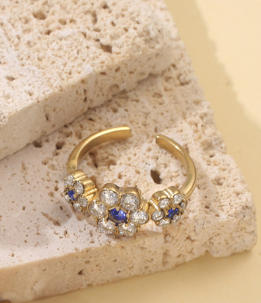 Bague ouverte trois fleurs zircons cœur