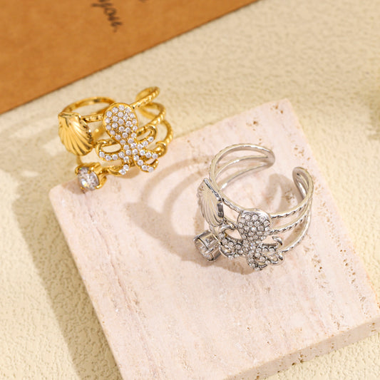 Bague ajustable poulpe strassé et coquillage
