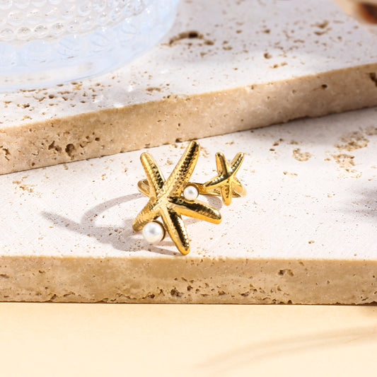 Bague dorée ouverte à l'avant à 2 étoiles de mer avec perles