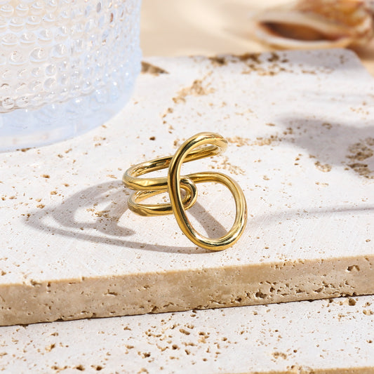 Bague ouverte design boucle sculptée