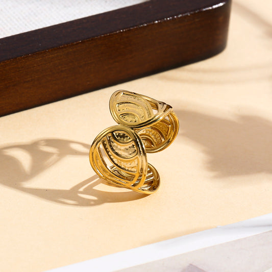 Bague ajustable à motifs ethniques ajourés