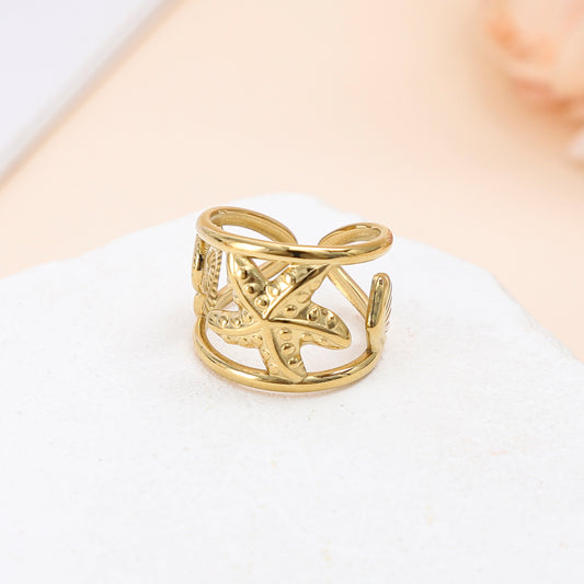 Bague dorée ouverte étoile de mer design ajouré