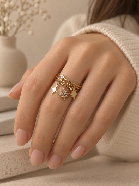 Bague multi lignes avec pendentifs étoilés