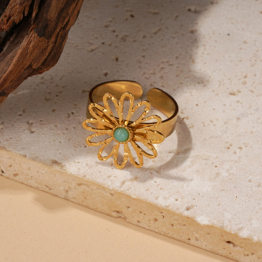 Bague dorée ajustable marguerite ajourée pierre