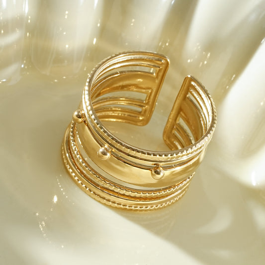 Bague multi-rangs ajourés et perlés
