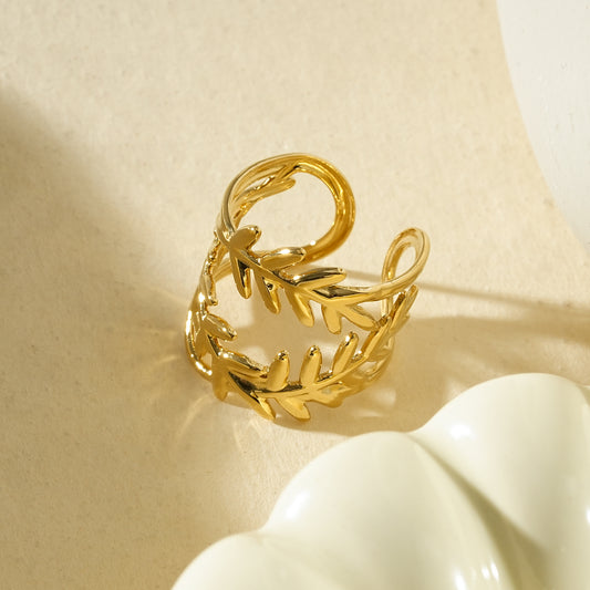 Bague dorée ajustable double branche de feuilles