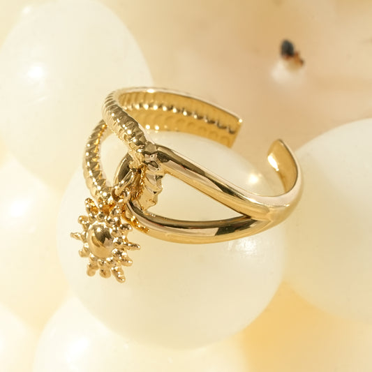 Bague dorée ajustable double anneaux avec pendentif soleil