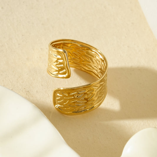 Bague large martelée gouttes doré