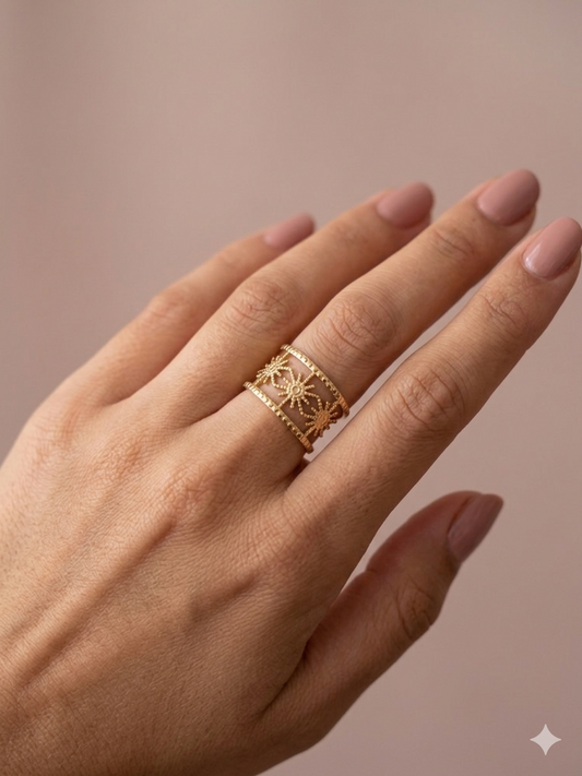 Bague dorée ajustable triple soleils graphiques