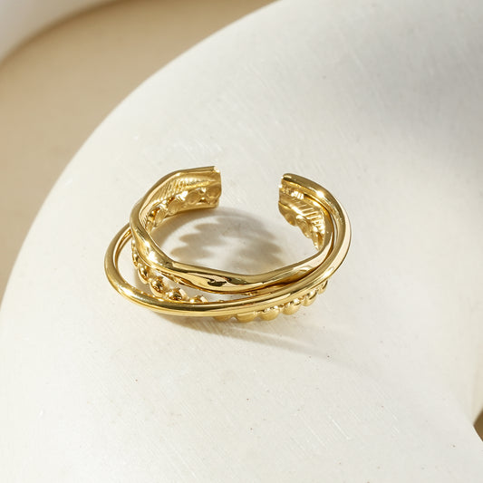 Bague multi-rangs torsadé et perlé doré