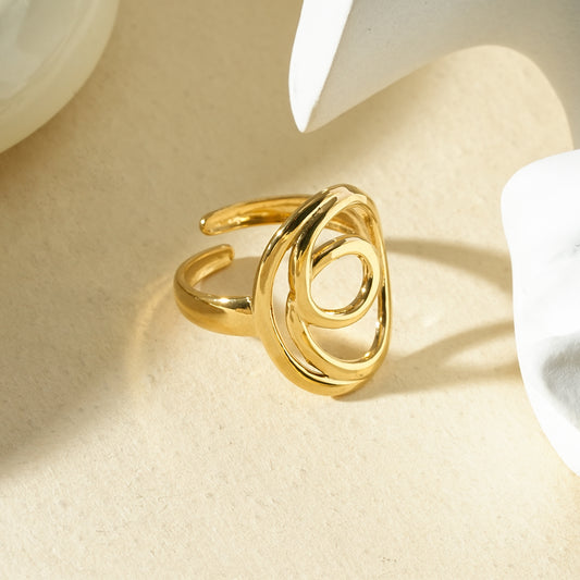 Bague ajustable dorée spirale sculpturale