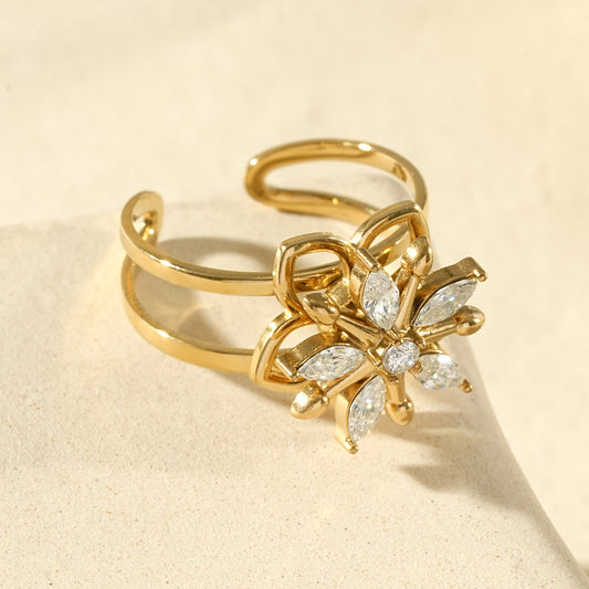 Bague ajustable anti-stress fleur ajourée et strass