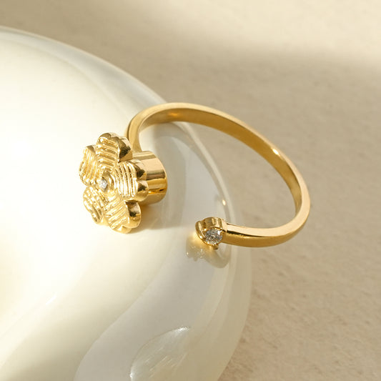 Bague ajustable anti-stress fleur gravée et strass
