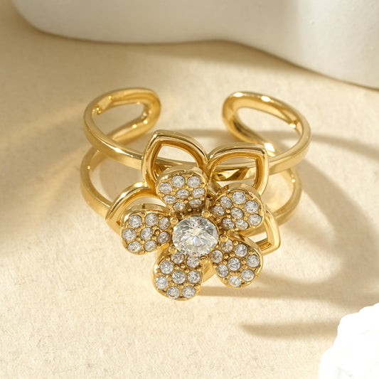Bague anti-stress ajustable fleur pavée de strass