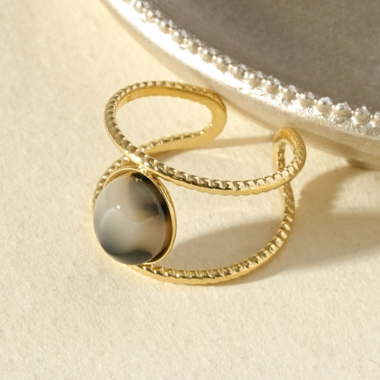 Bague ronde double anneau torsadé doré léopard