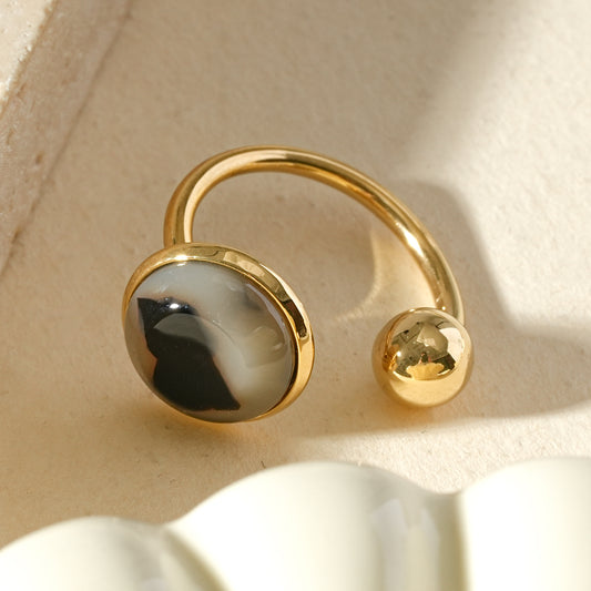 Bague résine léopard ronde et perle doré