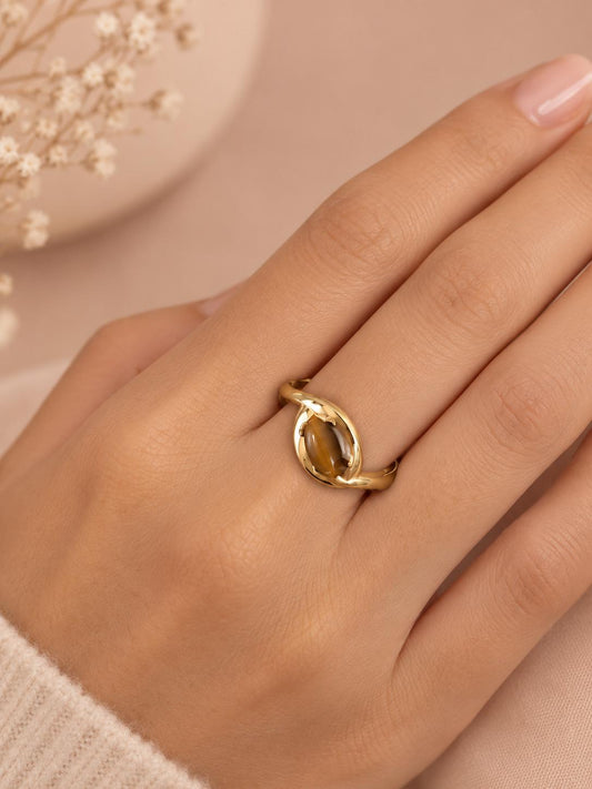 Bague pierre œil de tigre torsadée doré