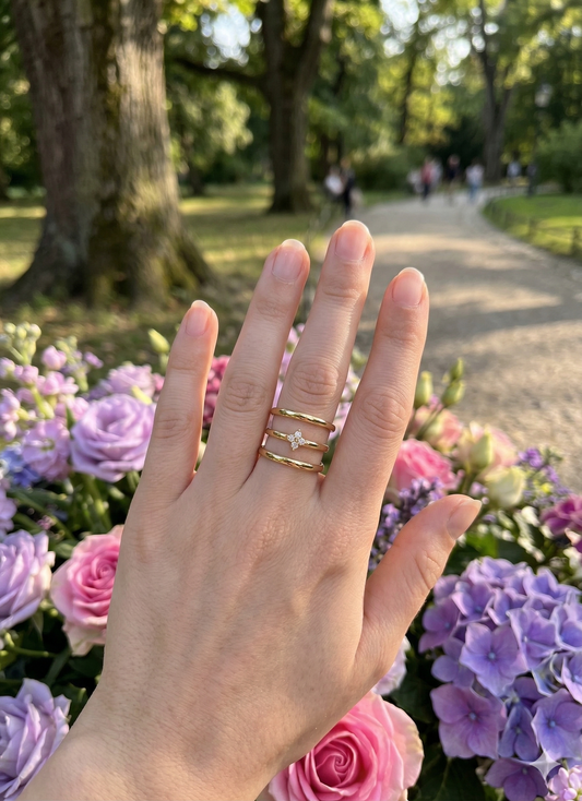 Bague ouverte triple anneaux avec strass central