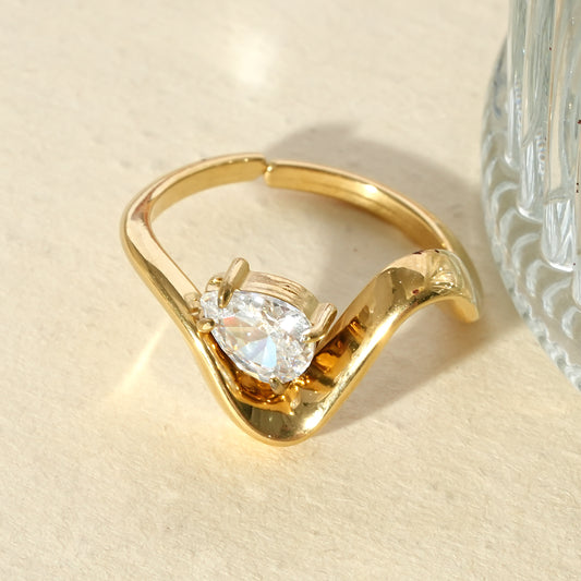 Bague ouverte en vague et strass goutte