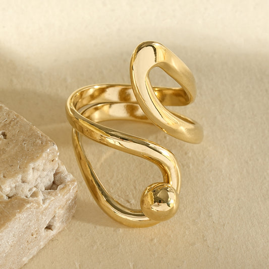 Bague sculpturale à boucles asymétriques