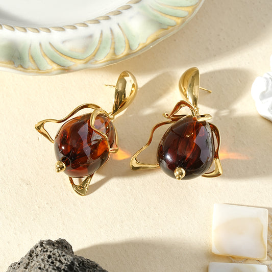 Boucles d'oreilles pendantes fleur ouverte perle de verre ambrée