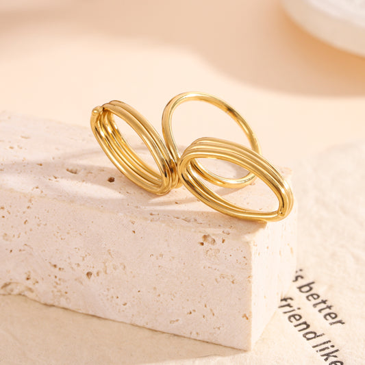 Bague dorée double anneau ovale en forme de ressort